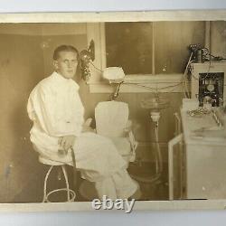 Antique Sepia Photograph Handsome Young Man Dentist Lots Of Equipment Medical