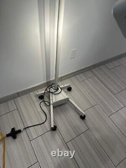 Burton Medical Exam Light on Rolling Base