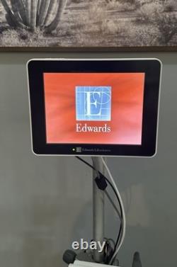 EDWARDS LIFESCIENCES EV1000 HEMODYNAMIC MONITORING SYSTEM WithCABLES & Roll STAND
