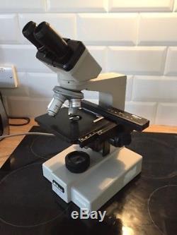 Nikon Model SC Binocular Microscope +4 Objectives