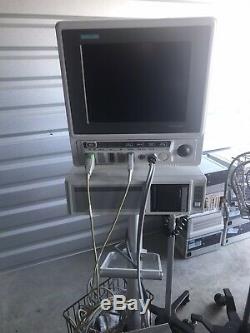 Strage Unit Containing Medical Equipment And Office Artwork