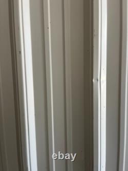 Two medical Stainless Steel pass thru Cabinets 2 doors each side sold separately