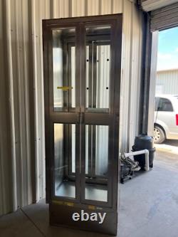Two medical Stainless Steel pass thru Cabinets 2 doors each side sold separately